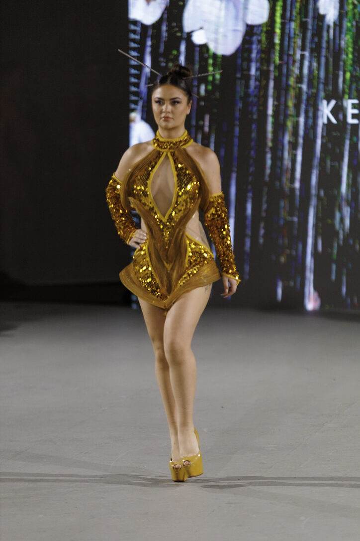 Gold structured mini dress from LA Fashion Week / The Bureau