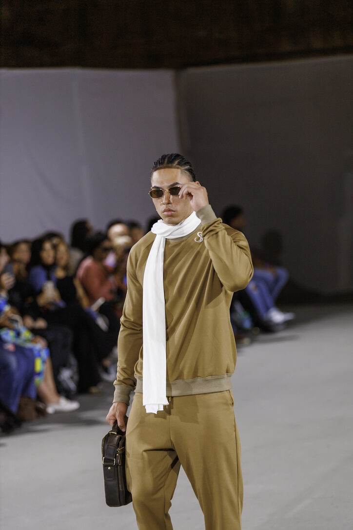 Camel jacket and white scarf from LA Fashion Week / The Bureau