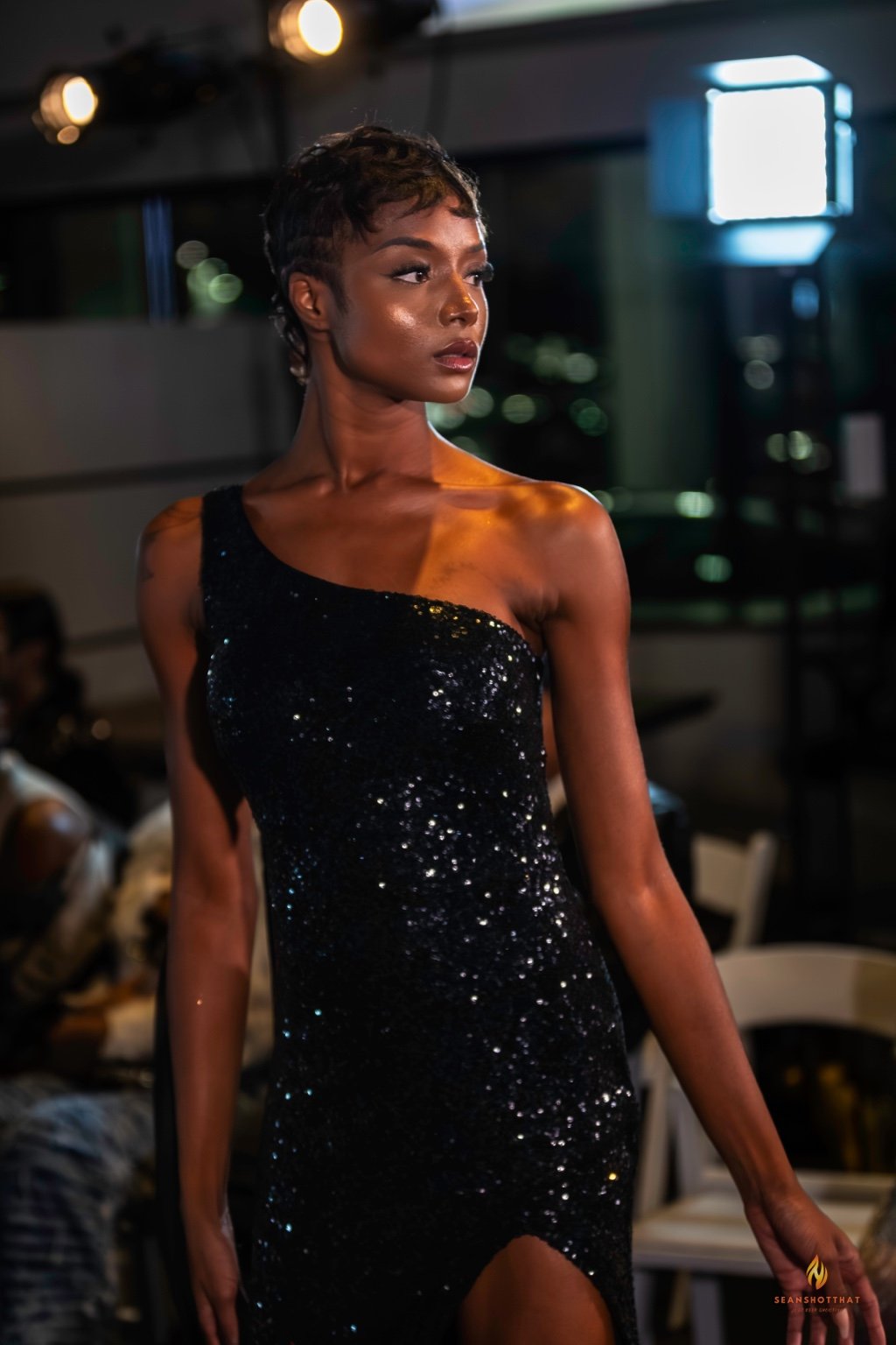 Sequin runway look under spotlights